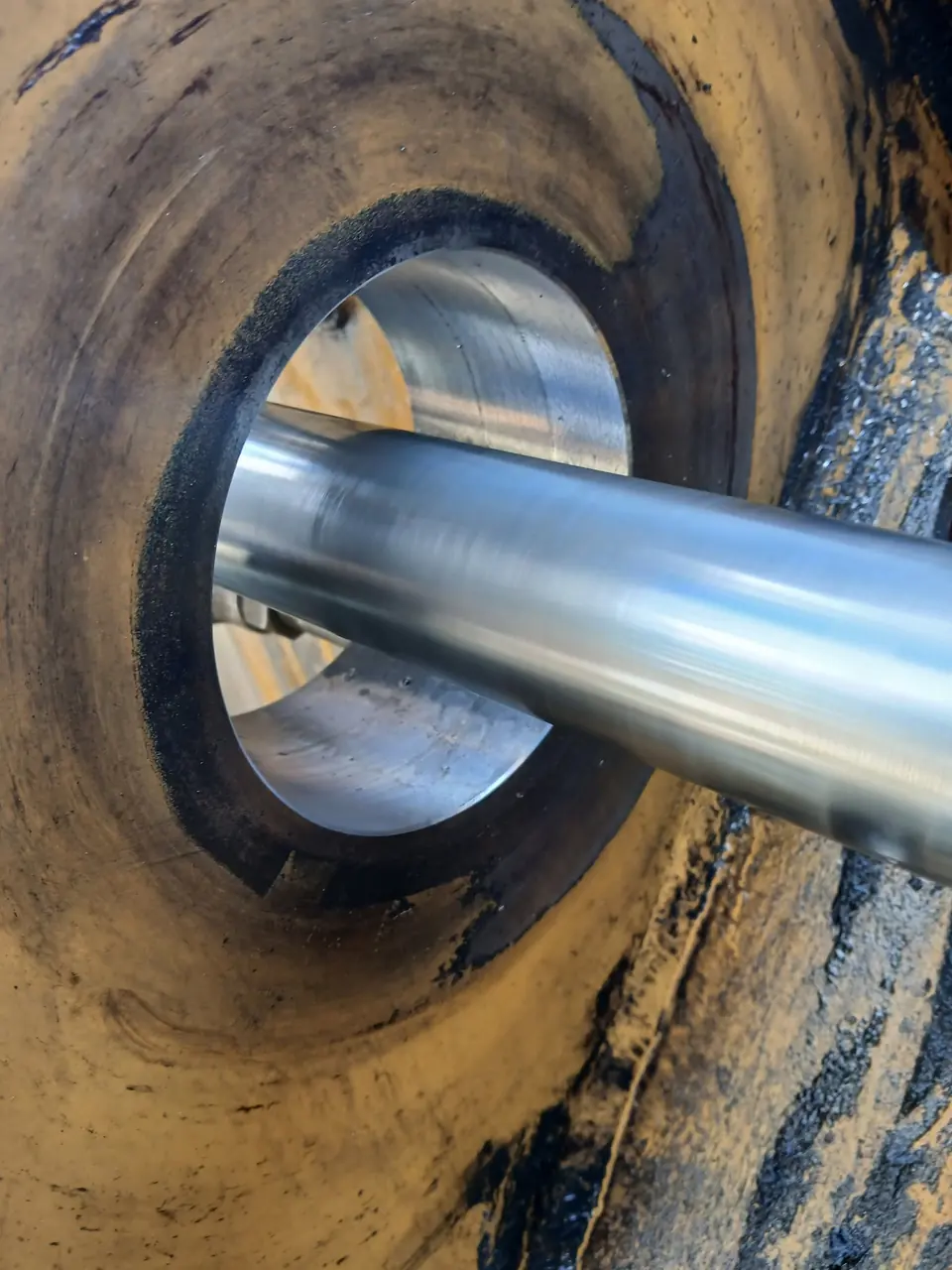 Freshly machined bore with a polished shaft fitted through it