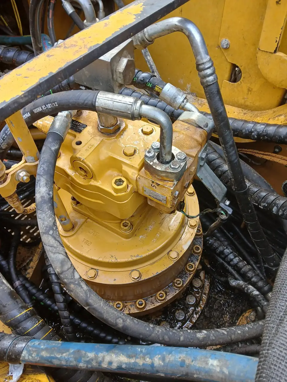 Hydraulic components and hoses opened up on a machine