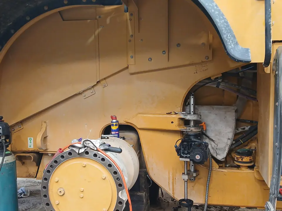 Final drive assembly out of a wheel loader for repair