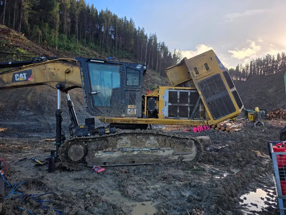 Machine partly dismantled on site with panels and guards removed