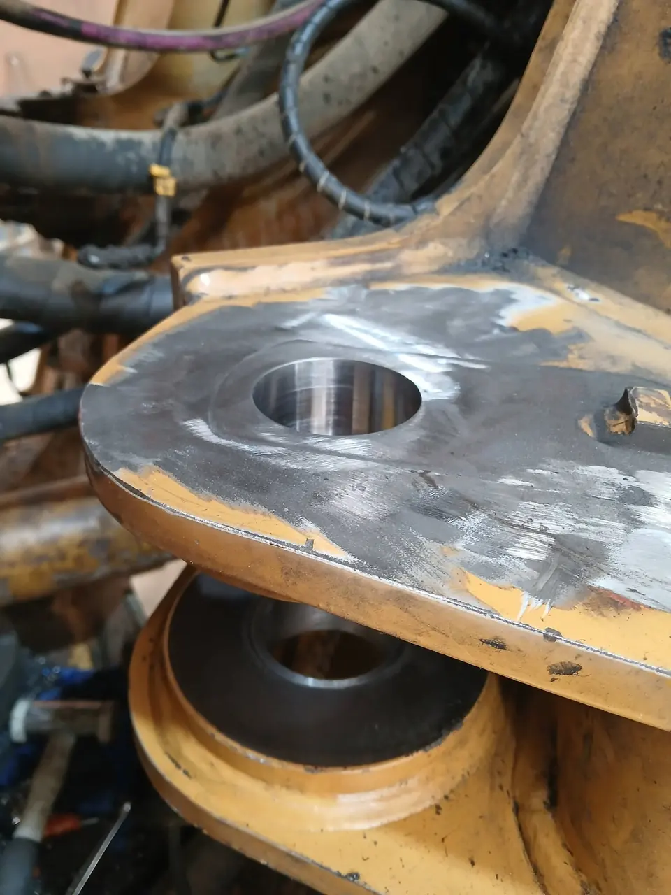 Machined flange face and bore on a dismantled component