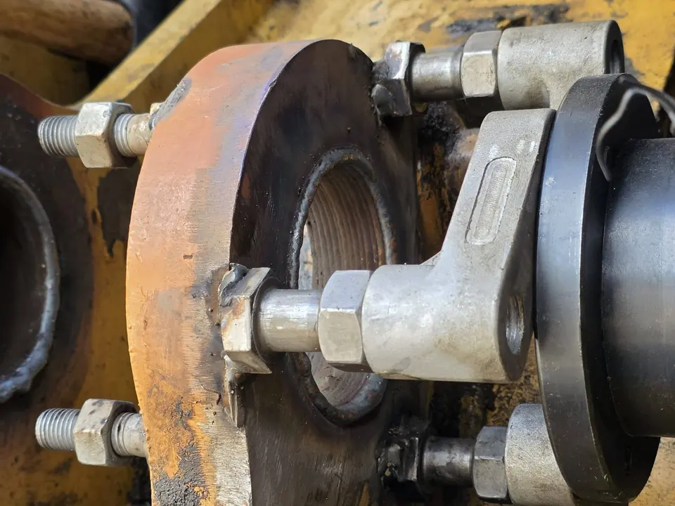 New pin fitted and retaining plate bolted up