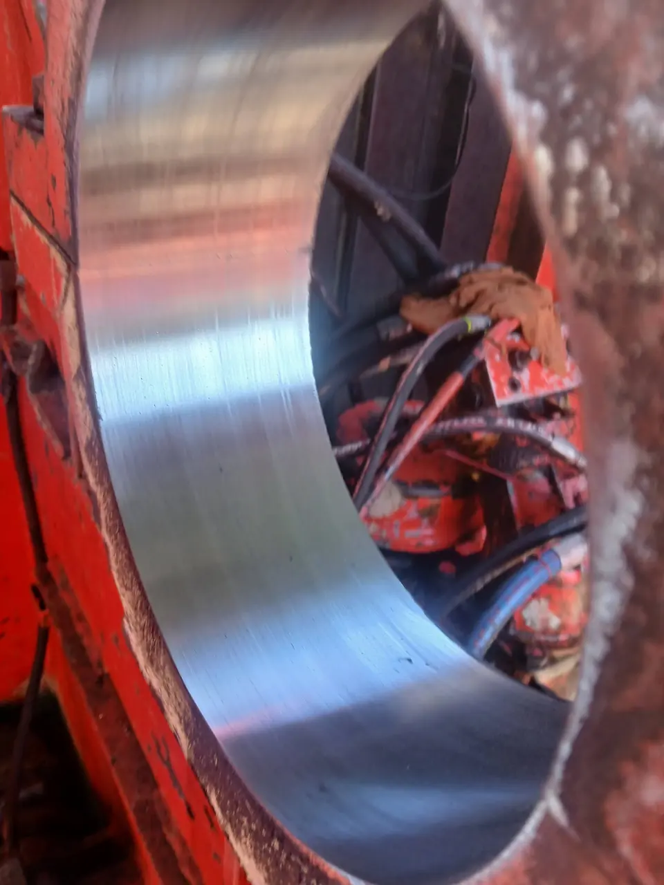 Spiral weld buildup laid right through the inside of a large bore